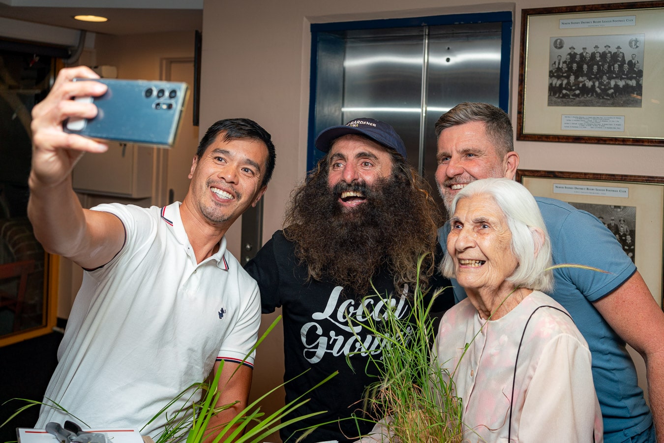 Costa Georgiadis takes selfie with winners of North Sydney Garden Competition 2023