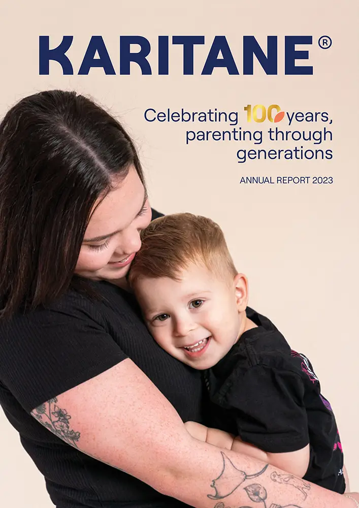 Mother holding baby in a studio portrait for Karitane annual report photography