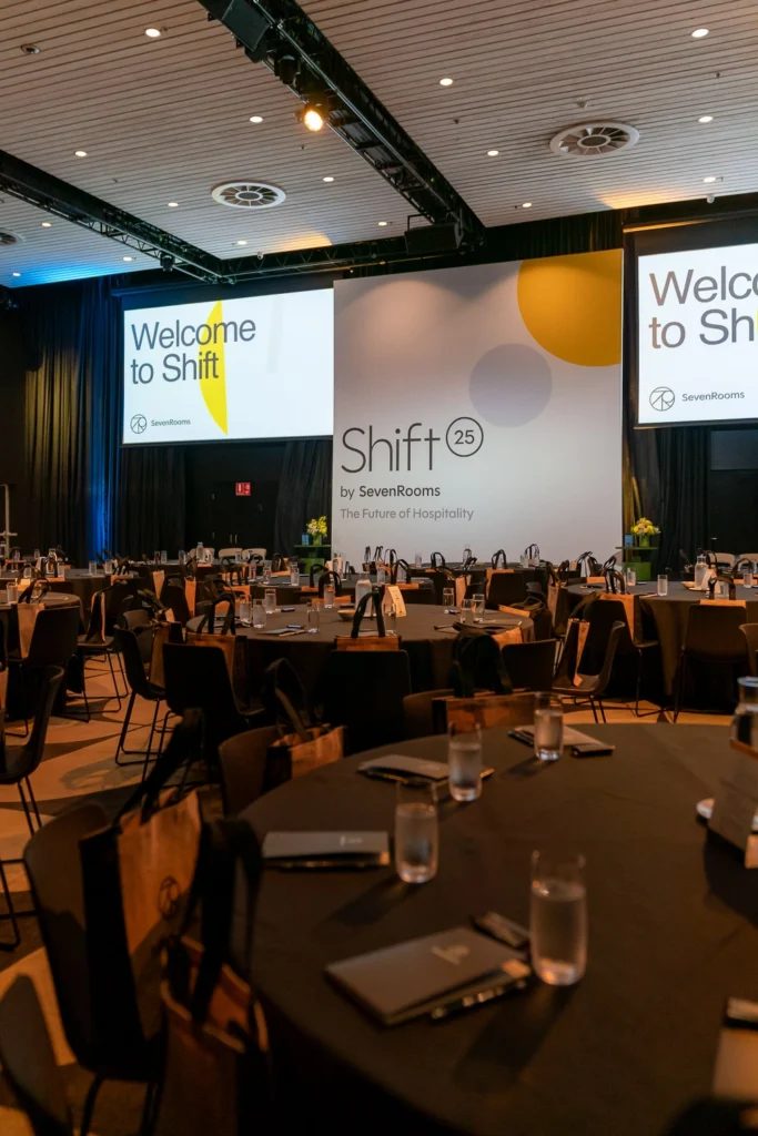 Conference branding displayed at Ivy Ballroom during industry event