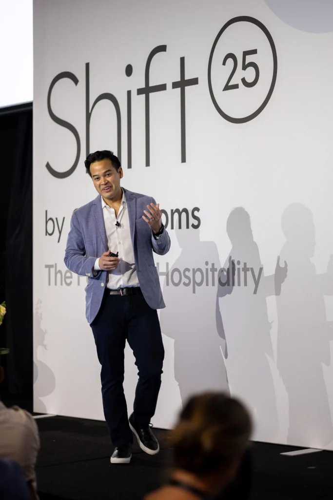 Speaker addressing audience during keynote session