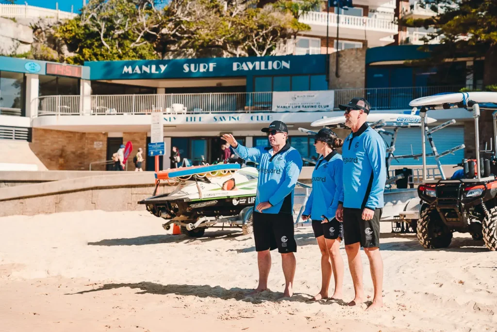 Lifeguards preparing rescue equipment on Northern Beaches beach