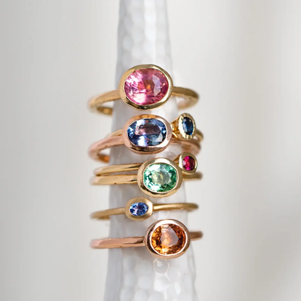 Gold tourmaline rings photographed in studio