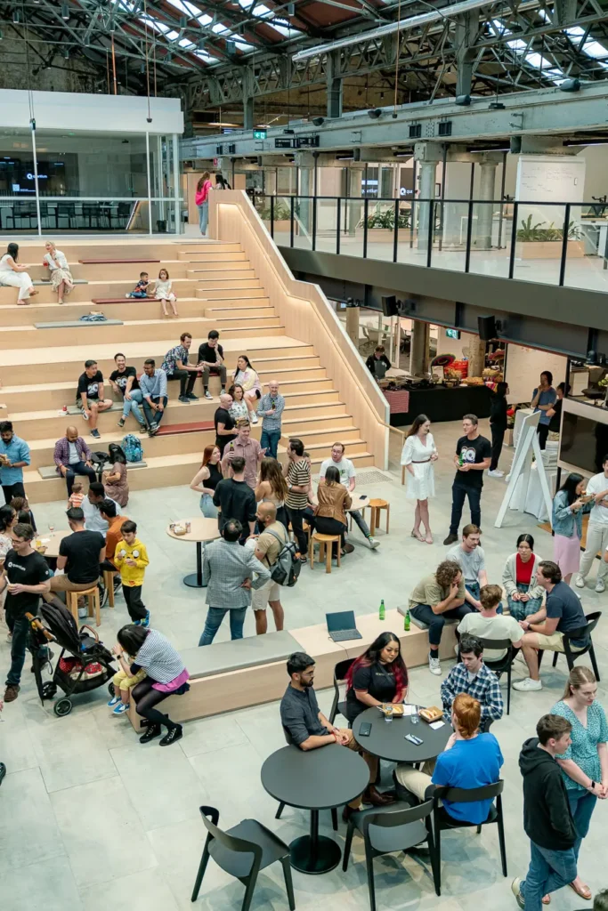 Guests gathered at an office Christmas event in Sydney