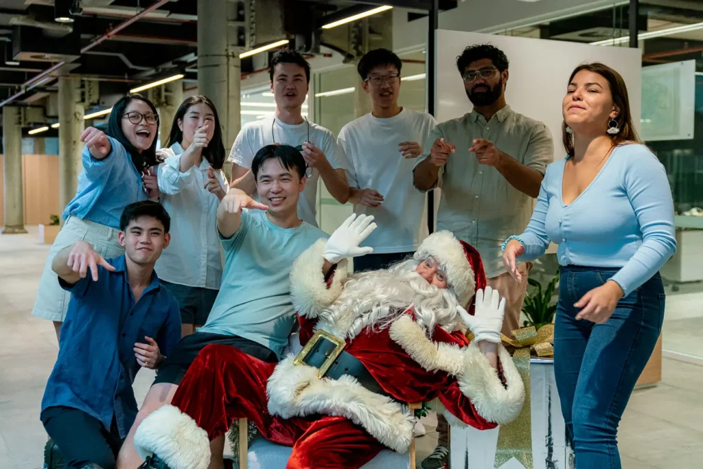 Team group photo with Santa at a Sydney Christmas party