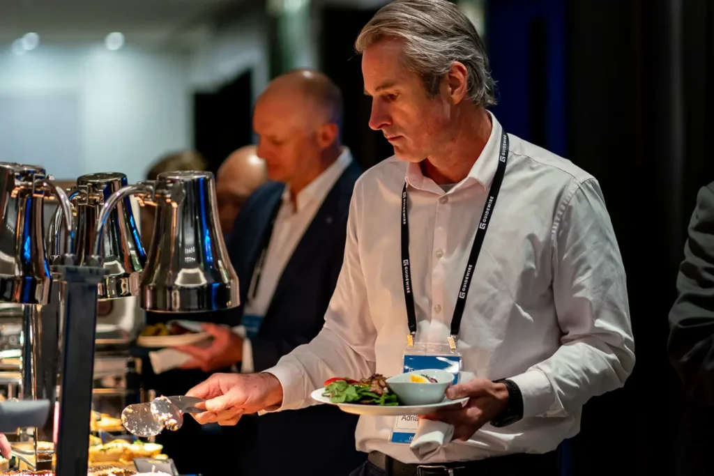Attendees networking during lunch at Guidewire Insurance Forum Sydney 2023
