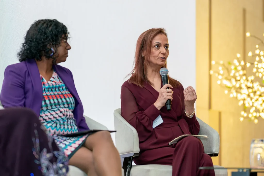 Lama Al-Akhras speaking during the panel discussion at the conference in Parramatta