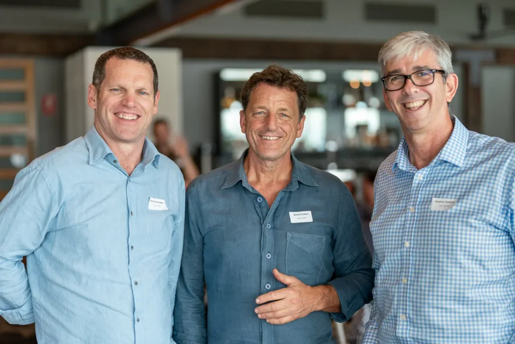 Three guests posing together at the Michael Morgan OAM lunch