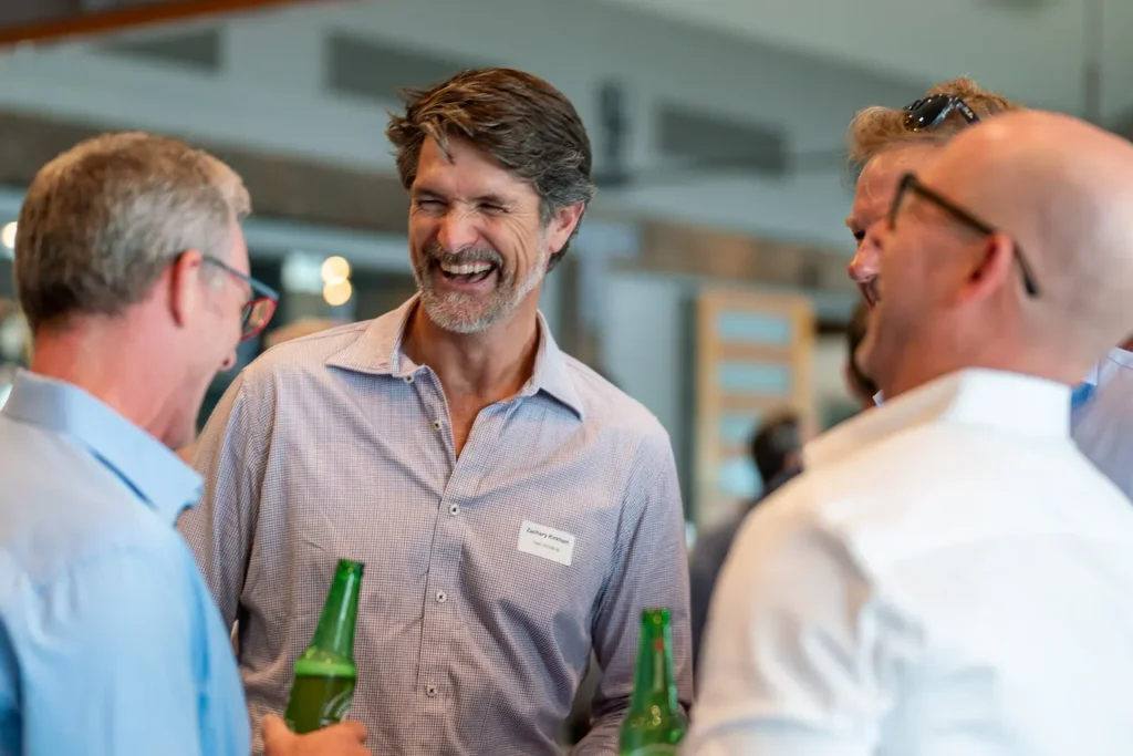 Guest smiling during the Michael Morgan OAM lunch at Deckhouse Woolwich