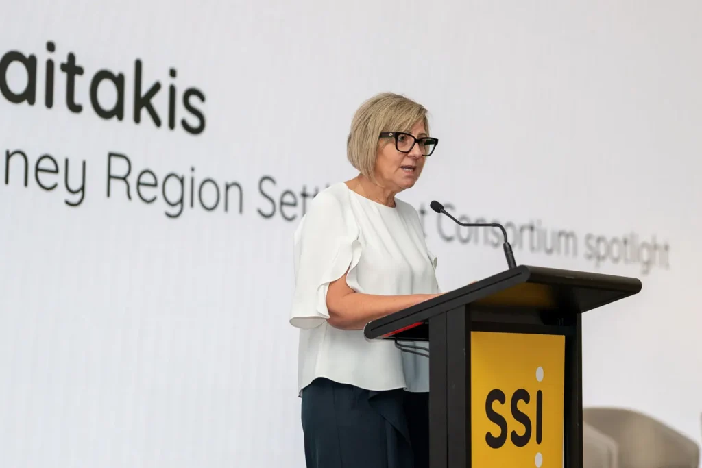 Speaker presenting from the SSI podium during the conference in Parramatta