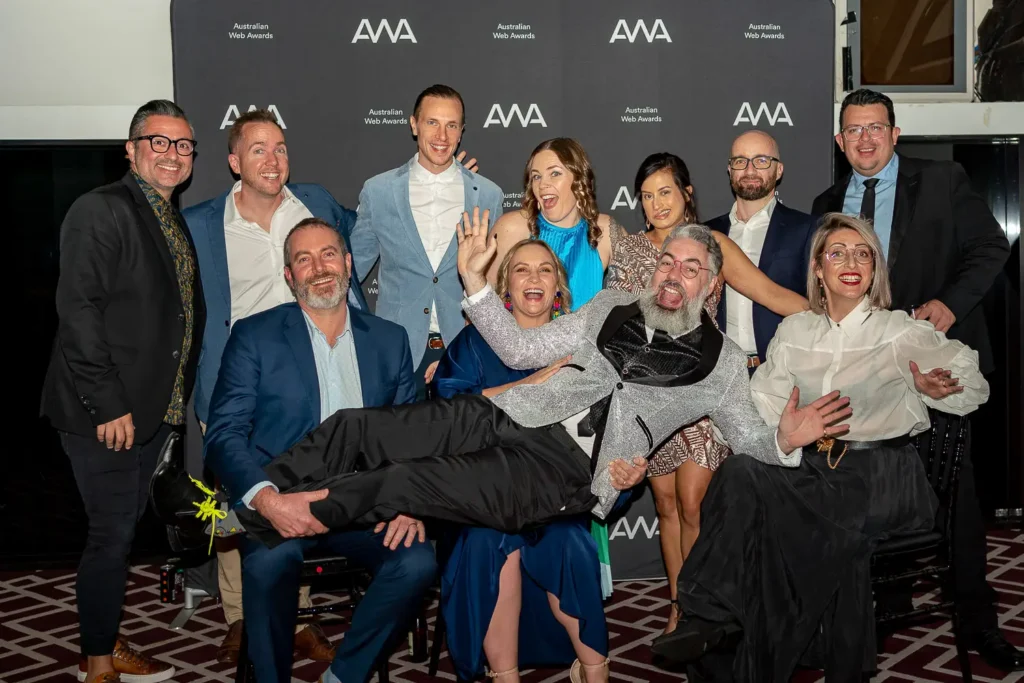 Finalists and winners posing with Australian Web Awards trophies
