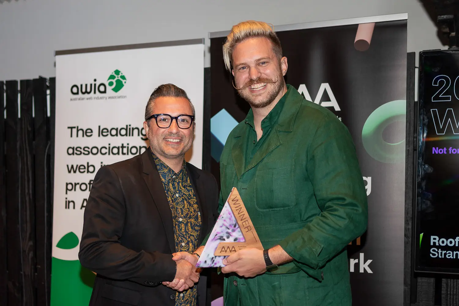 Australian Web Awards winner receiving an award
