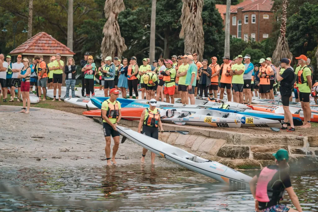 Competitors and spectators gathering at the Bay to Beach race start line