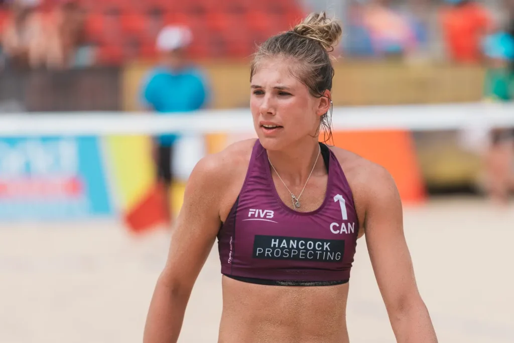 Portrait of a Canadian beach volleyball athlete during competition on a sunny day