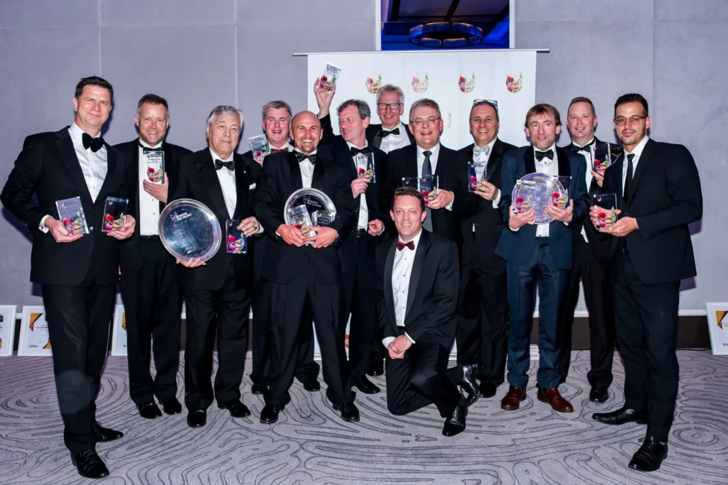 Group photo of award winners at Sydney corporate awards event