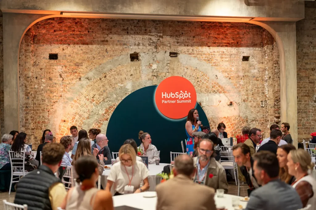 Event host speaking during HubSpot Partner Summit at Alpha Dining Sydney