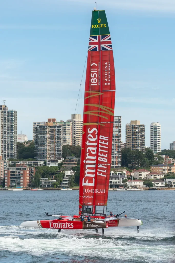 Emirates Great Britain F50 catamaran racing with the Sydney skyline in the background