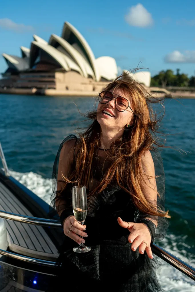 Guest enjoying Sydney Harbour executive boat cruise near Opera House