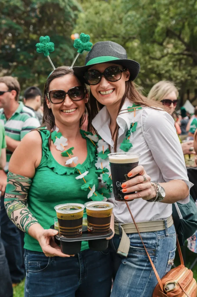 Portrait of man wearing Irish commemorative blazer and shamrock tie at festival