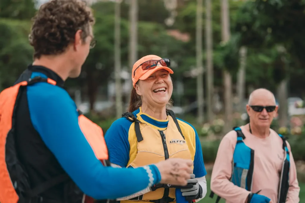 Competitor smiling during the Bay to Beach fundraising event on Sydney Harbour