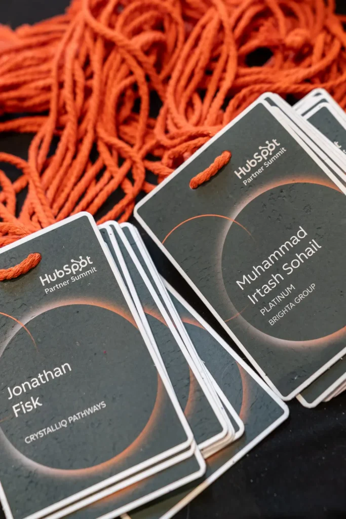 HubSpot Partner Summit name tags displayed at Alpha Dining Sydney conference venue