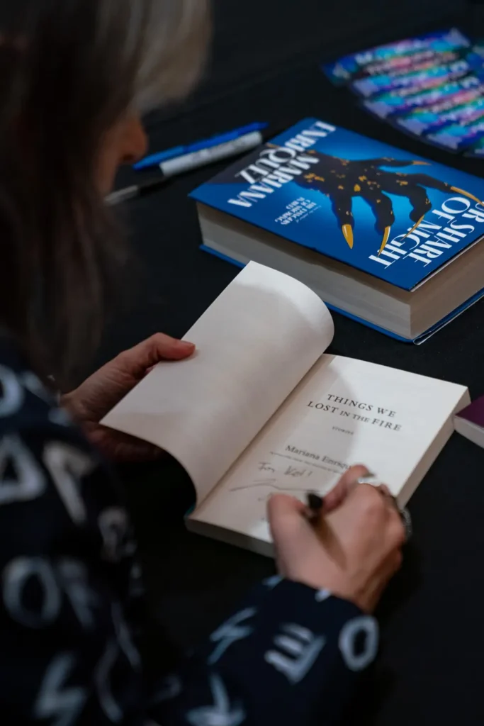 Mariana Enriquez signing copies of Things We Lost in the Fire after her Melbourne event