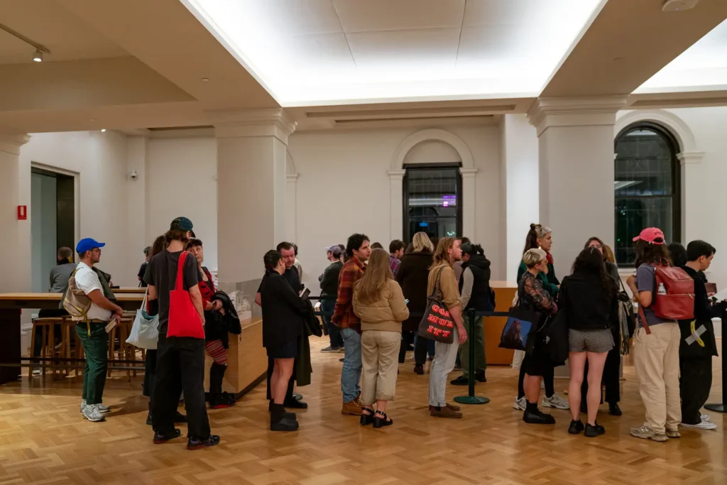 Attendees gathering after the Mariana Enriquez Benengeli 2025 event in Melbourne