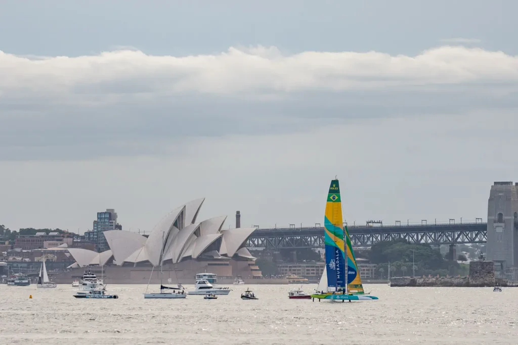 Mubadala Brazil SailGP boat racing near the Sydney Opera House and Harbour Bridge