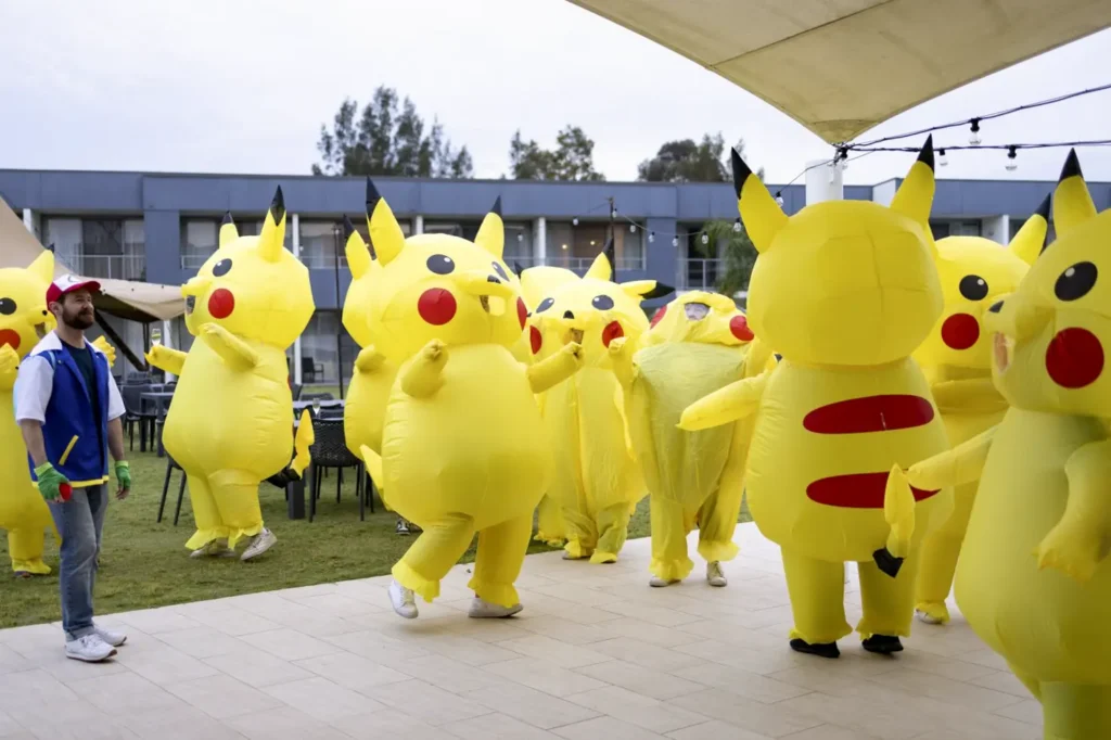 Participants dressed as Pikachu during a fun corporate team building activity