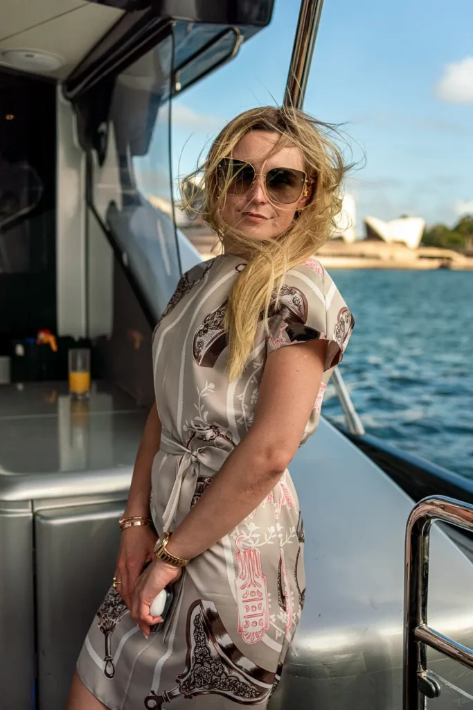 Female guest aboard Privacy luxury yacht near Sydney Opera House