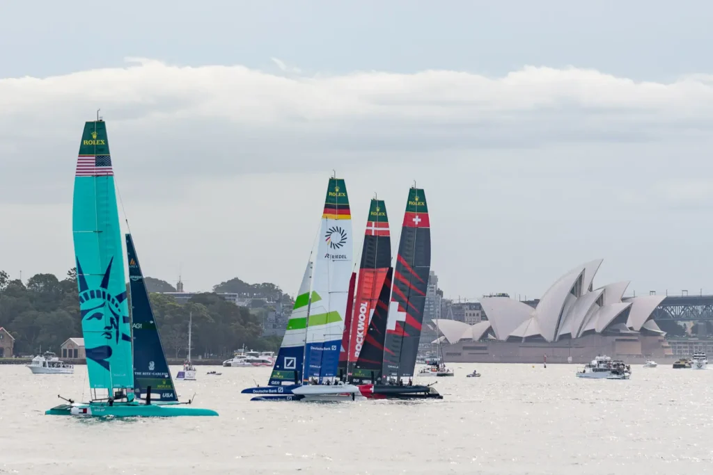 SailGP racing fleet passing the Sydney Opera House during SailGP Sydney 2026