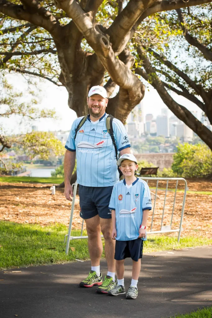 Family participating in the Seven Bridges Walk community fundraiser in Sydney