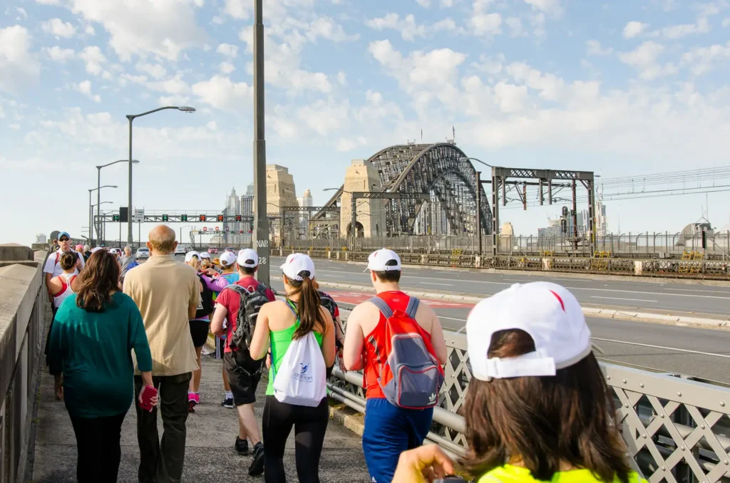 Participants walking across the Sydney Harbour Bridge during Seven Bridges Walk