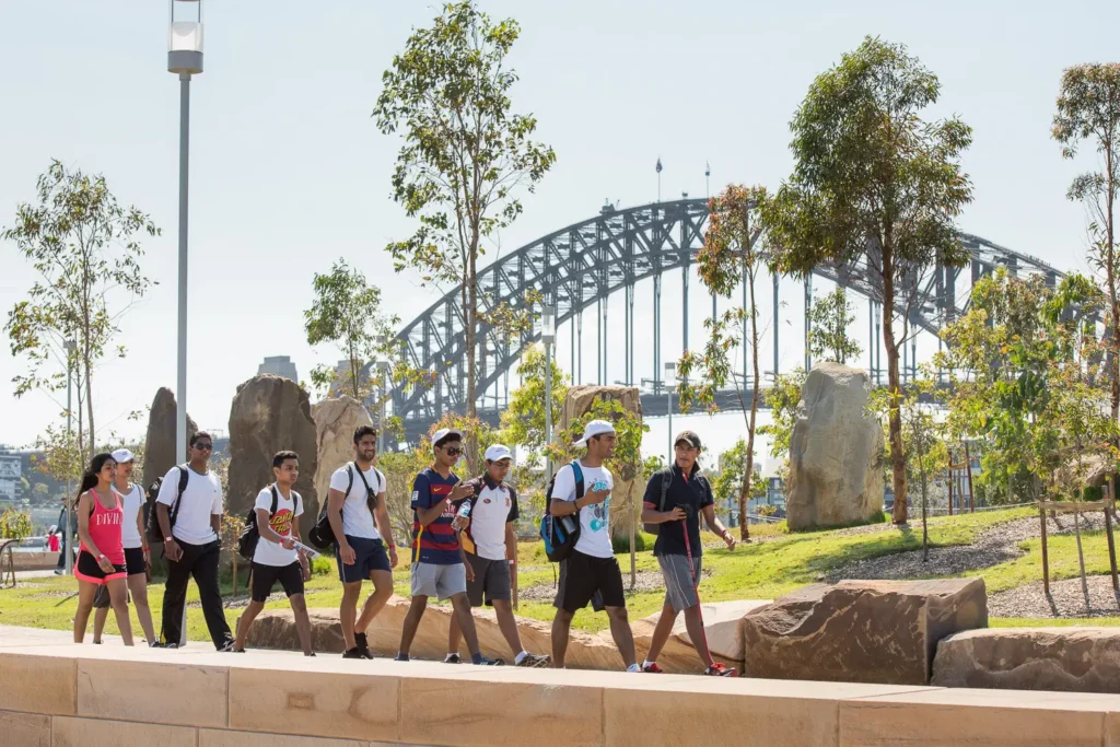 Participants walking along the Sydney Harbour foreshore during Seven Bridges Walk