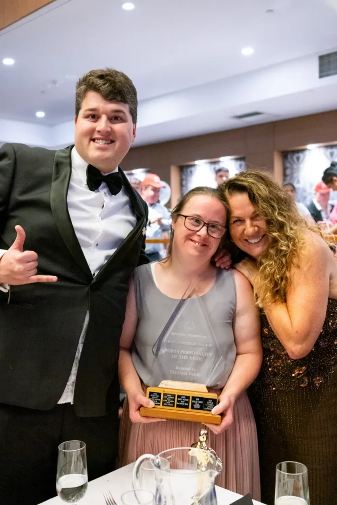 Award winner posing with Sports Personality of the Year trophy at gala dinner