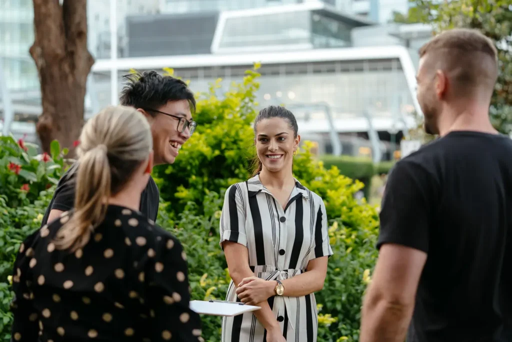 Team members networking during a corporate team building event in Sydney