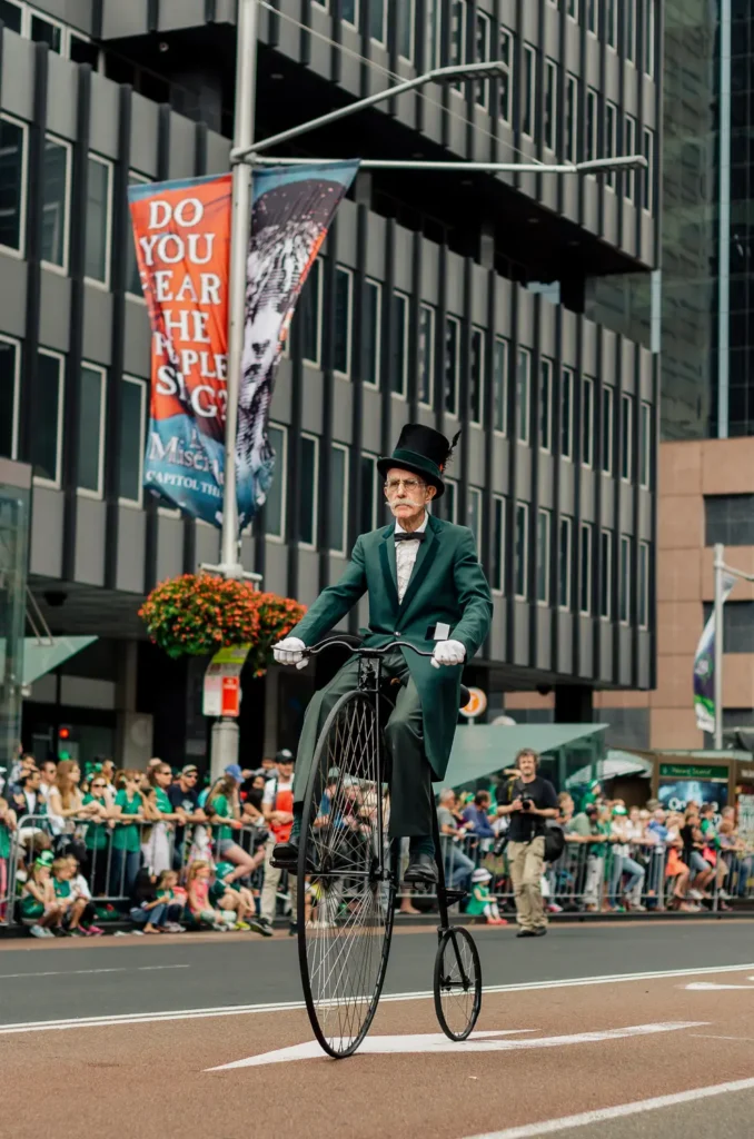 Vintage penny farthing bicycle performer at Sydney St Patrick’s Day Parade