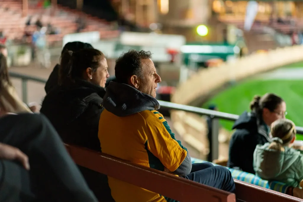 Spectators watching the Matildas match from the grandstand at North Sydney Oval