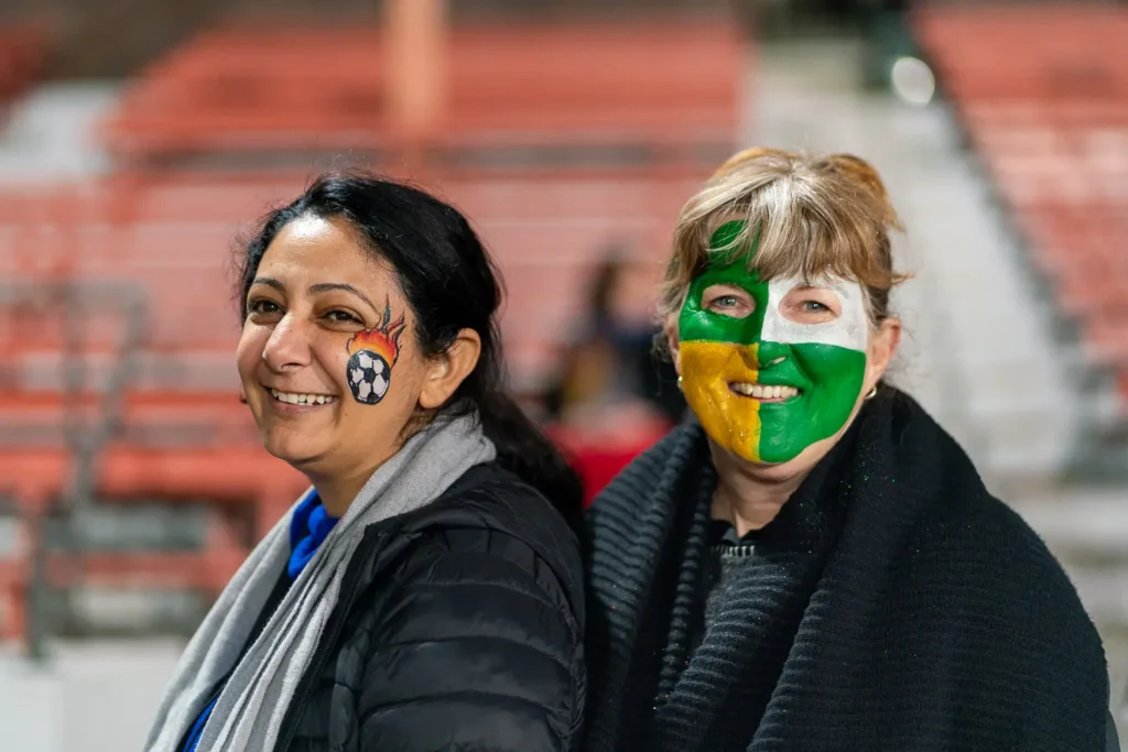 Two Matildas supporters showing their face paint at North Sydney Oval