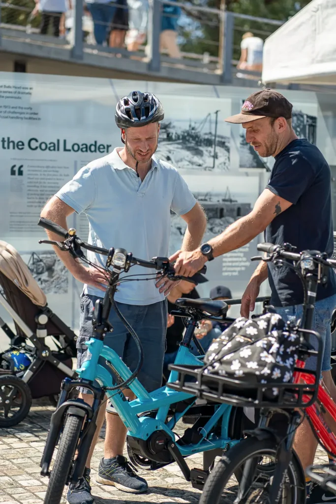 Visitors exploring electric bikes at the Coal Loader Sustainability Festival in Waverton