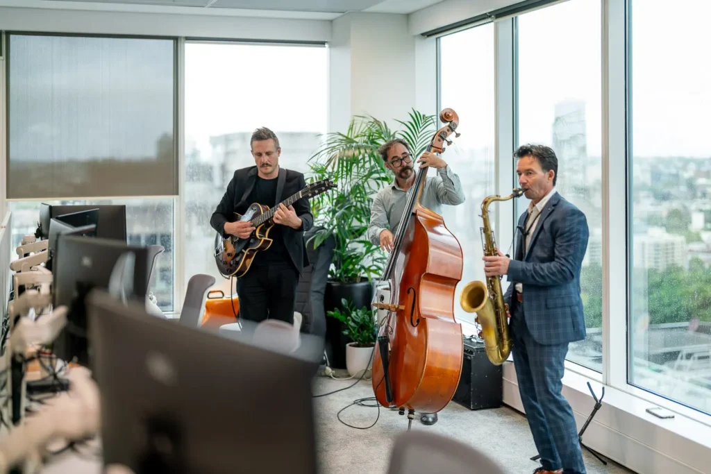 Live jazz band performing at the Guidewire Sydney office opening event