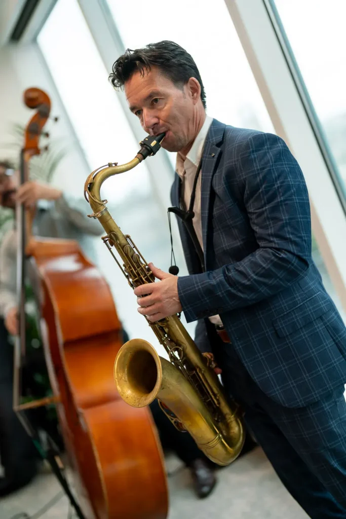 Saxophone player performing live at the Guidewire Sydney office opening