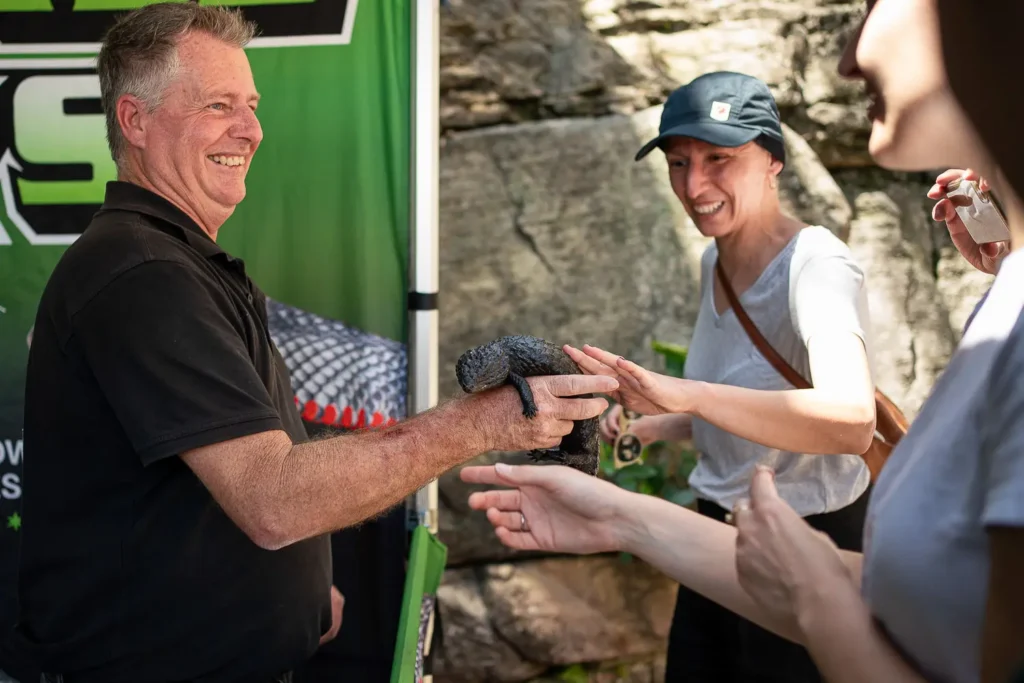 Visitors meeting native Australian wildlife during an interactive festival experience