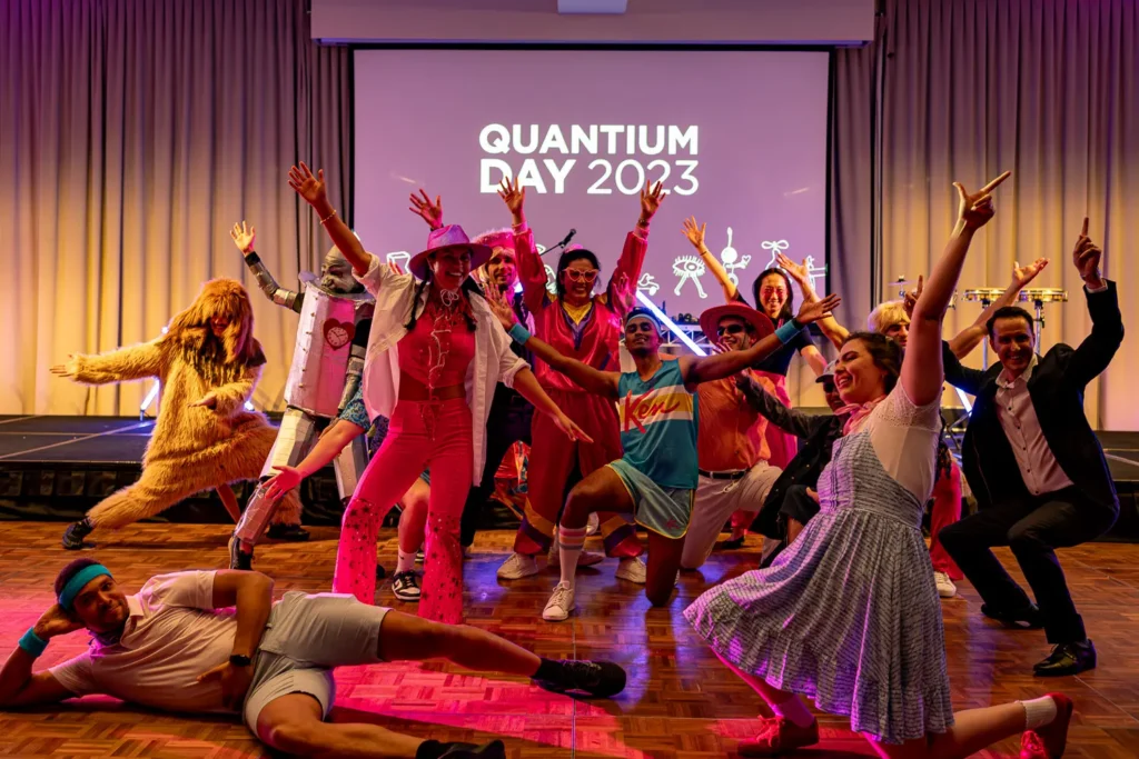 Colourful group celebration at Quantum Day 2023 at Rydges Hunter Valley