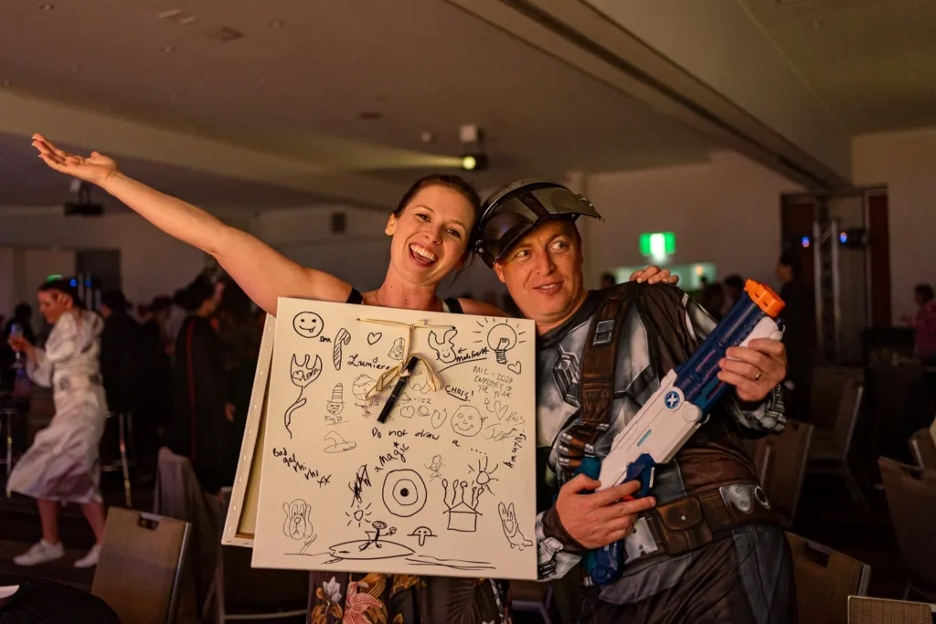 Group of guests in pop culture costumes at Quantum Day 2023