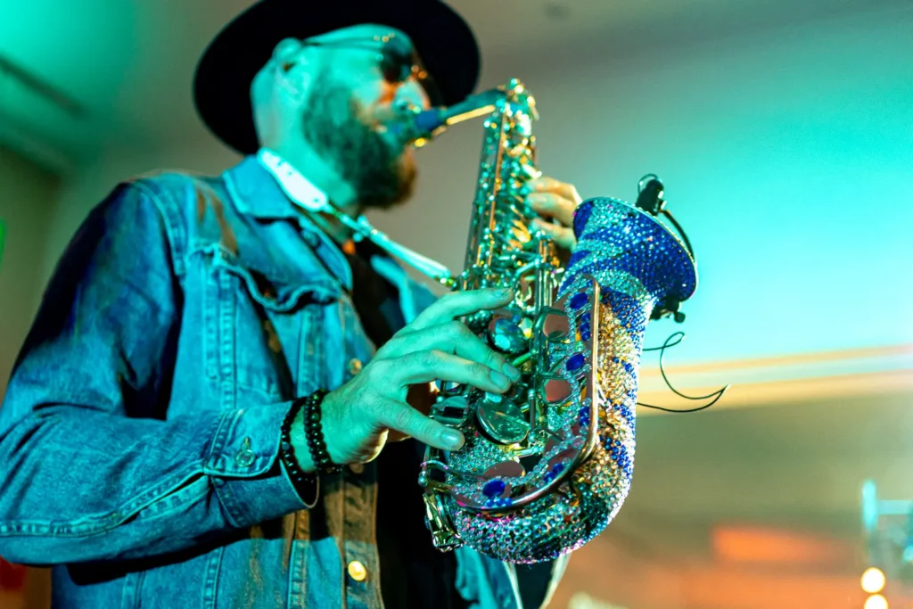 Live saxophonist performing at Quantum Day 2023 corporate event