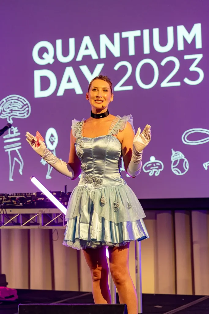Stage host performing at Quantum Day 2023 at Rydges Hunter Valley