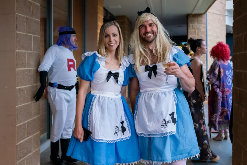 Guests in Alice in Wonderland costumes at the Quantum Day celebration