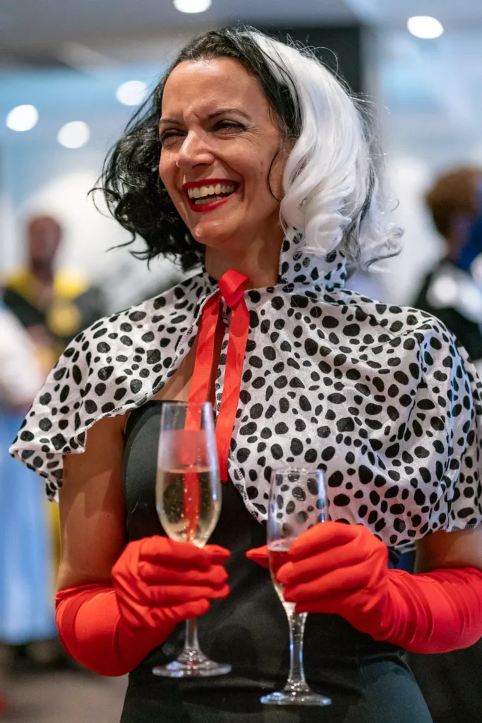 Guest dressed as Cruella at the Quantum Day corporate celebration