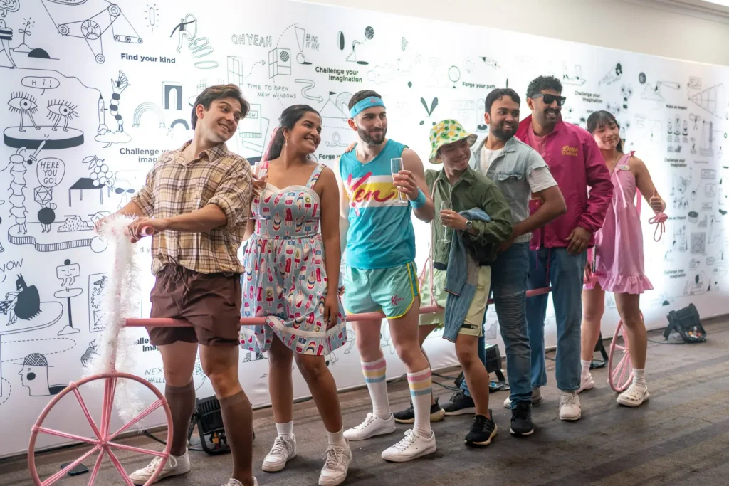 Team in themed costumes at the Quantum Day company celebration