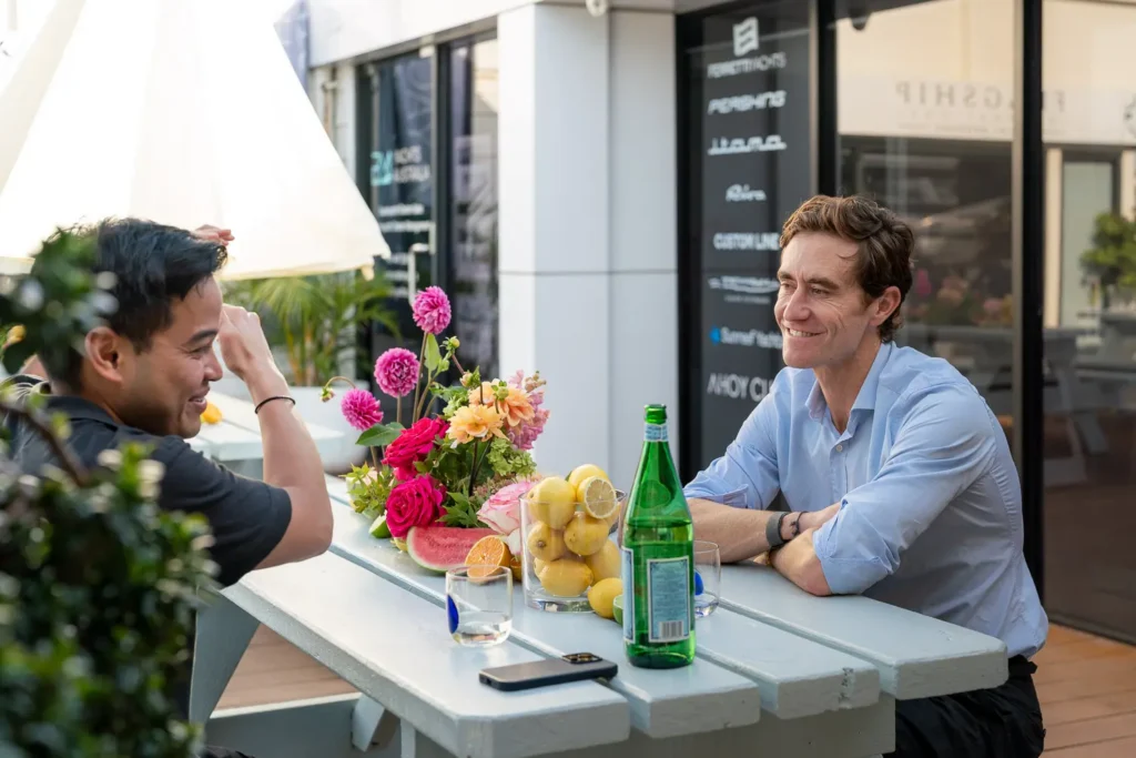 Guests chatting at the waterfront SHIFT Soirée in Rose Bay